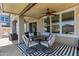 Inviting outdoor patio with seating and a ceiling fan for comfortable entertaining at 3692 N 292Nd Dr, Buckeye, AZ 85396