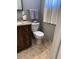 Bathroom features toilet, vanity with granite counter, and grey walls at 4020 N 44Th Pl, Phoenix, AZ 85018