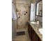 Bathroom features walk-in shower, tiled floor, and double vanity with granite counters at 4020 N 44Th Pl, Phoenix, AZ 85018