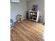 Bright playroom with laminate flooring, mini-split and storage shelf at 4020 N 44Th Pl, Phoenix, AZ 85018