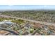Expansive aerial view showcasing a sprawling residential area with a nearby freeway at 4415 S Poplar St, Tempe, AZ 85282