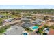 Aerial view of a suburban neighborhood with mature landscaping, swimming pools and nearby shopping at 4415 S Poplar St, Tempe, AZ 85282