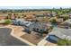This is an aerial view of a neighborhood with well-maintained homes and mature trees at 4415 S Poplar St, Tempe, AZ 85282