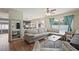 Spacious living room features hardwood floors, modern decor, and large windows at 4415 S Poplar St, Tempe, AZ 85282