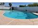 Refreshing pool with clean blue water and a surrounding concrete patio perfect for sunny days at 4415 S Poplar St, Tempe, AZ 85282