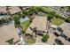 An aerial view showcases a stunning home, pool, putting green, and sports court for outdoor fun and leisure at 4463 S Oregon Ct, Chandler, AZ 85248