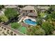 An amazing backyard with pool, sport court, putting green, lounge area and meticulously maintained landscaping at 4463 S Oregon Ct, Chandler, AZ 85248