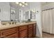 Spacious bathroom featuring dual sinks and custom cabinets at 4463 S Oregon Ct, Chandler, AZ 85248