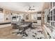 An inviting bonus room with a plush sofa, built-in shelving, and plenty of space to relax at 4463 S Oregon Ct, Chandler, AZ 85248