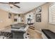 A comfortable bonus room with stylish furniture, personal decor, and a cozy atmosphere at 4463 S Oregon Ct, Chandler, AZ 85248