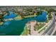 Scenic aerial view of a Primary-planned community with stunning waterfront homes, lush landscaping, and tranquil lakes at 4463 S Oregon Ct, Chandler, AZ 85248
