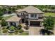 Stunning two-story home with desert landscaping, a tile roof, brick accents, and a spacious garage and driveway at 4463 S Oregon Ct, Chandler, AZ 85248