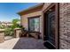 Inviting front entry with brickwork, wrought iron gate, and decorative door at 4463 S Oregon Ct, Chandler, AZ 85248