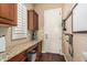 Functional mud room with custom cabinets, granite counters, and practical storage solutions at 4463 S Oregon Ct, Chandler, AZ 85248