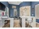 Bright office with blue walls, recessed lighting, and ample workspace at 4463 S Oregon Ct, Chandler, AZ 85248