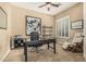 Dedicated office space featuring a large black desk and a comfortable ergonomic chair at 4463 S Oregon Ct, Chandler, AZ 85248