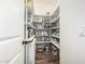 Walk-in pantry with wooden floors offers ample shelving for storage of food and kitchen supplies at 4463 S Oregon Ct, Chandler, AZ 85248