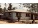 Cozy home with framed windows, and mature landscaping, offering a serene setting at 461 N Cheri Lynn Dr, Chandler, AZ 85225