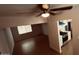 Bright eat-in kitchen features modern appliances, tile flooring, and a ceiling fan for optimal comfort at 461 N Cheri Lynn Dr, Chandler, AZ 85225