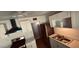 Modern kitchen with stainless steel appliances, sleek countertops, and contemporary white cabinetry at 461 N Cheri Lynn Dr, Chandler, AZ 85225