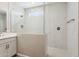 Beautiful bathroom with a glass enclosed shower, double vanity, and modern fixtures at 5815 E Covey Ln, Phoenix, AZ 85054