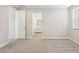 Bedroom featuring carpeted floors, and an ensuite bathroom with neutral color palette at 5815 E Covey Ln, Phoenix, AZ 85054