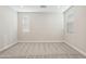 A bedroom featuring neutral tones, carpeted floors and a window with light-filtering blinds at 5815 E Covey Ln, Phoenix, AZ 85054