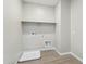 Laundry room with hookups and tile flooring at 5815 E Covey Ln, Phoenix, AZ 85054