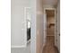 The upstairs hallway has two hallways that lead to bedrooms and closets at 5831 E Covey Ln, Phoenix, AZ 85054