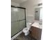 Bathroom with a toilet, vanity with sink, and shower with sliding glass doors at 6029 N 31St Ave, Phoenix, AZ 85017