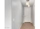 Clean entryway with tiled floor, pendant lights and white door at 6300 S Nash Way, Chandler, AZ 85249