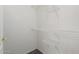 Walk-in closet with wire shelving and carpeted floor at 6300 S Nash Way, Chandler, AZ 85249