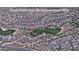 Aerial view of home on lush green golf course with private desert views at 6481 E Amber Sun Dr, Scottsdale, AZ 85266