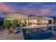 Backyard pool and patio offer stunning space for relaxation and entertaining friends and Gathering at 6481 E Amber Sun Dr, Scottsdale, AZ 85266