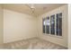 Bright bedroom with plantation shutters and neutral walls, offering a cozy and inviting atmosphere at 6481 E Amber Sun Dr, Scottsdale, AZ 85266