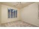 A clean and inviting bedroom features neutral walls, plush carpeting, and plantation shutters at 6481 E Amber Sun Dr, Scottsdale, AZ 85266