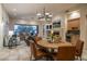 Inviting dining area with a fireplace, and ample seating perfect for gatherings at 6481 E Amber Sun Dr, Scottsdale, AZ 85266