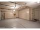Well-organized garage with plenty of cabinet space and a clean epoxy floor, ideal for storage at 6481 E Amber Sun Dr, Scottsdale, AZ 85266