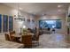 Living room including fireplace, couch, and open-concept floorplan at 6481 E Amber Sun Dr, Scottsdale, AZ 85266