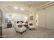 Serene main bedroom featuring custom decor, and two white chairs at 6481 E Amber Sun Dr, Scottsdale, AZ 85266