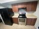 Functional kitchen showcasing stainless steel oven and ample countertop space for meal prep at 6911 W Devonshire Ave # 1269, Phoenix, AZ 85033