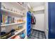 Walk-in closet with built in shelving and storage at 8219 S Pecan Grove Cir, Tempe, AZ 85284