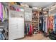 Walk-in closet with custom built-ins, shelving, and plenty of storage space at 8219 S Pecan Grove Cir, Tempe, AZ 85284