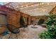 Private courtyard with brick pavers, pergola, string lights, water feature, and relaxing seating at 8219 S Pecan Grove Cir, Tempe, AZ 85284