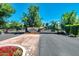 Welcoming entrance to the Carver Ranch Estates community with lush landscaping at 8219 S Pecan Grove Cir, Tempe, AZ 85284