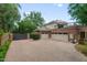Spacious three car garage and large driveway at 8219 S Pecan Grove Cir, Tempe, AZ 85284