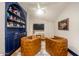 Living room with modern lighting, entertainment center, and comfortable seating at 8219 S Pecan Grove Cir, Tempe, AZ 85284