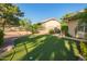 A pristine putting green in the backyard is perfect for golfers at 8402 W Rosemonte Dr, Peoria, AZ 85382