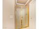 Framed shower stall with a gold trim and a glass door at 8402 W Rosemonte Dr, Peoria, AZ 85382
