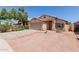 Charming single-story home with desert landscaping, two-car garage and covered entryway at 8622 W Shaw Butte Dr, Peoria, AZ 85345